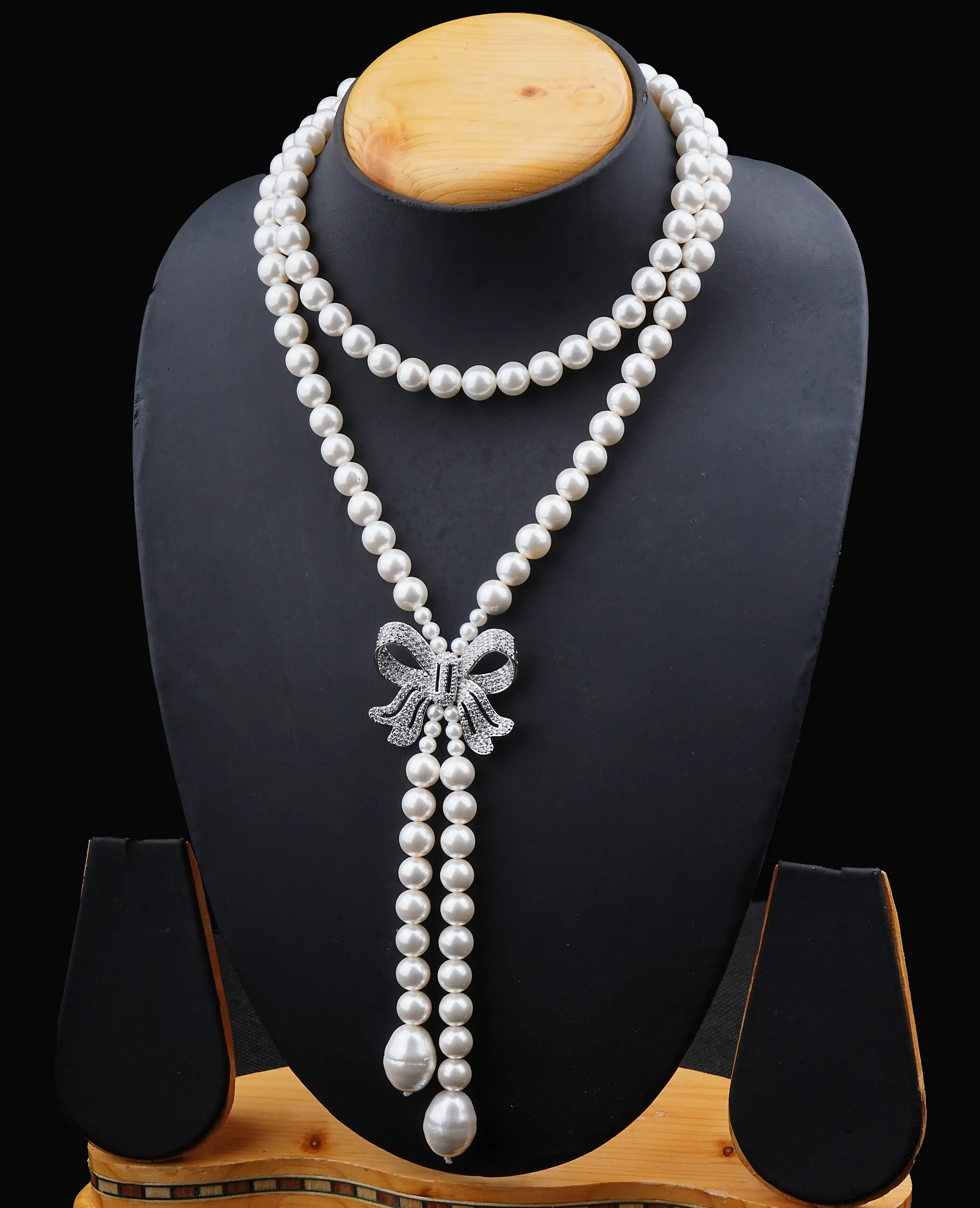 Elegant AD Bow & Pearl Long Necklace - Statement Piece